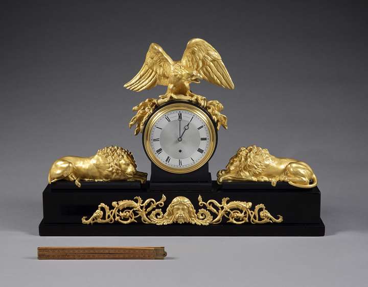 A George IV black marble and ormolu mantel clock, No. 1921